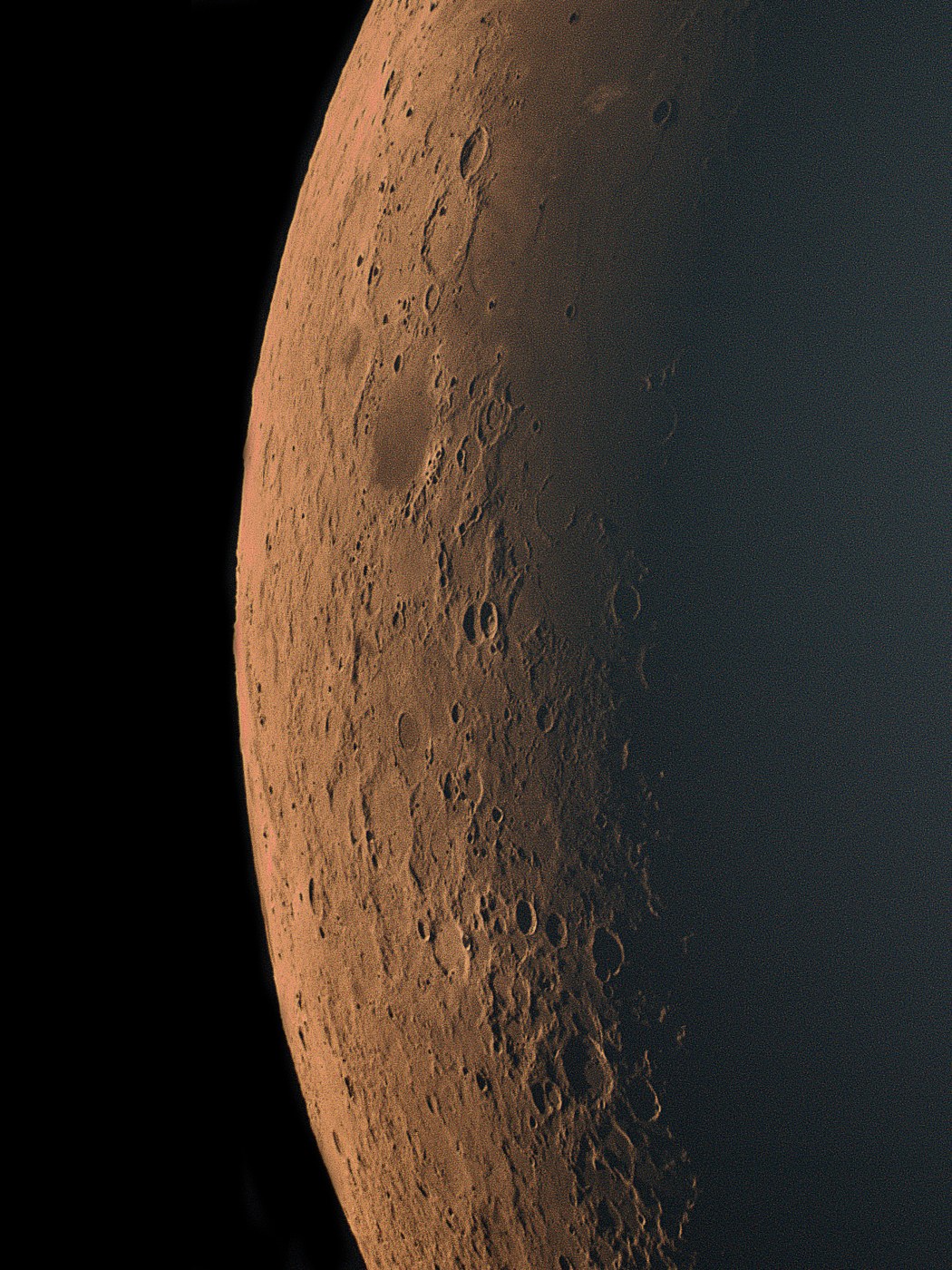 Close-up of the crater-covered lunar limb at low sun angle